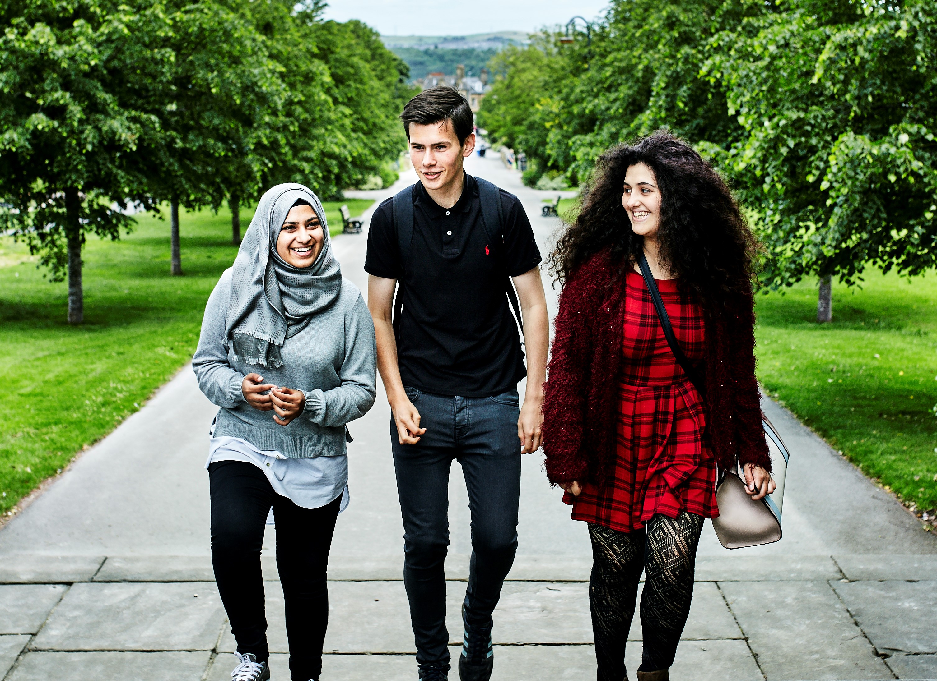 Three students walking