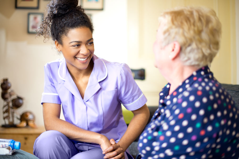 Nurse talking to a woman