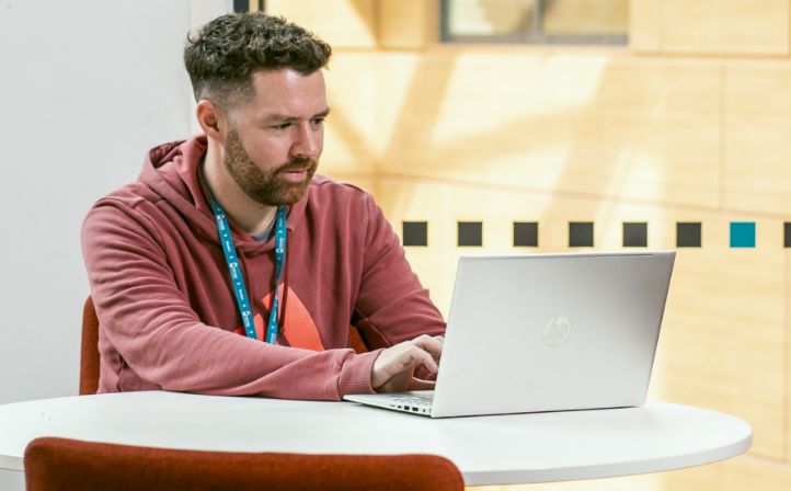 Mature student working on his Laptop