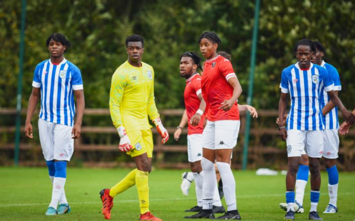 Hudderfield Town academy players playing against Salford Football Club