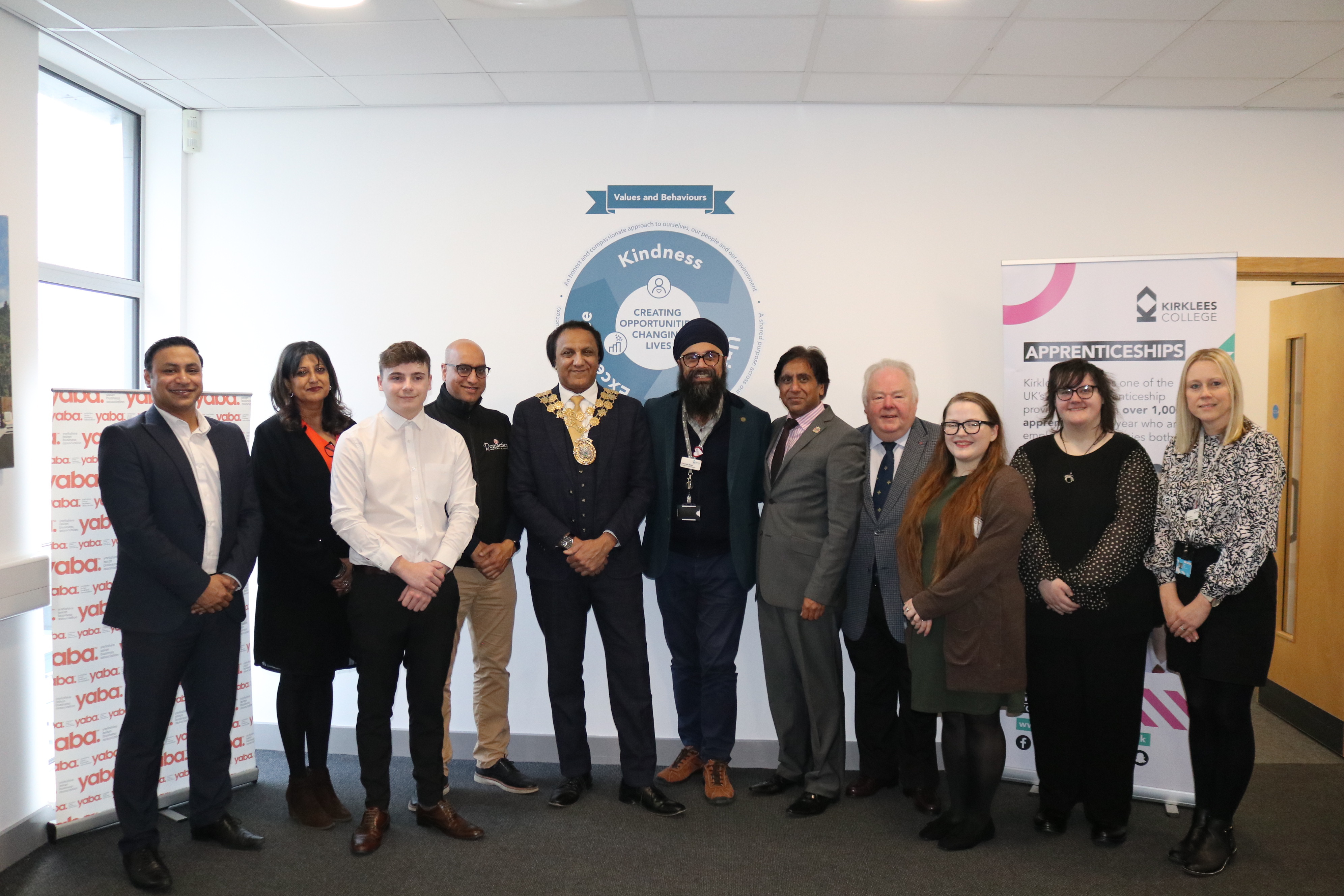 Members of Kirklees College and YABA gather for a photo opportunity to celebrate their new partnership.