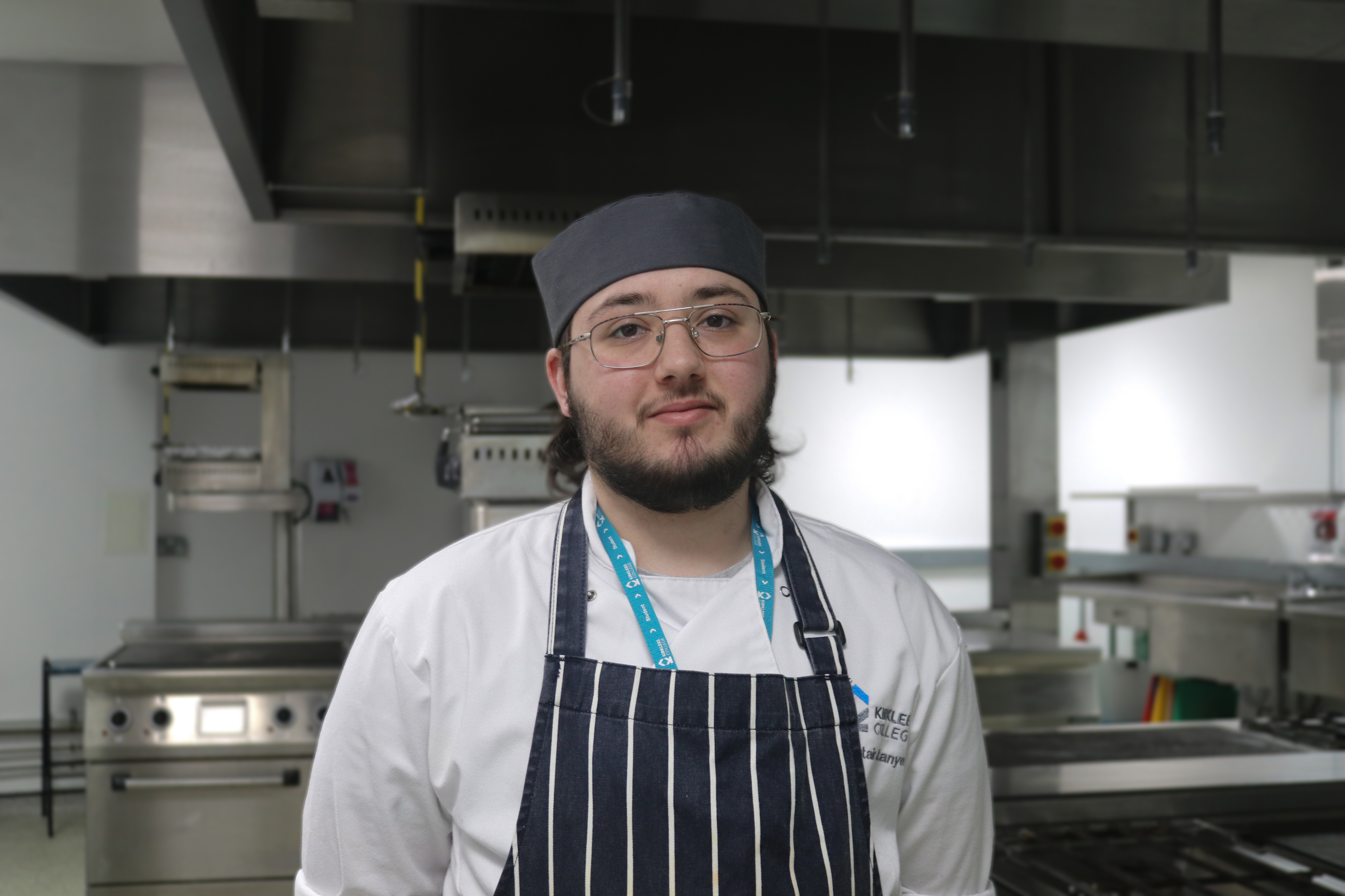 Photo of Alistair Stanyer in the training kitchens at college