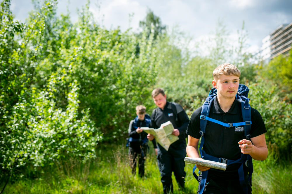 Three Male Public Services Hiking and Orienteering