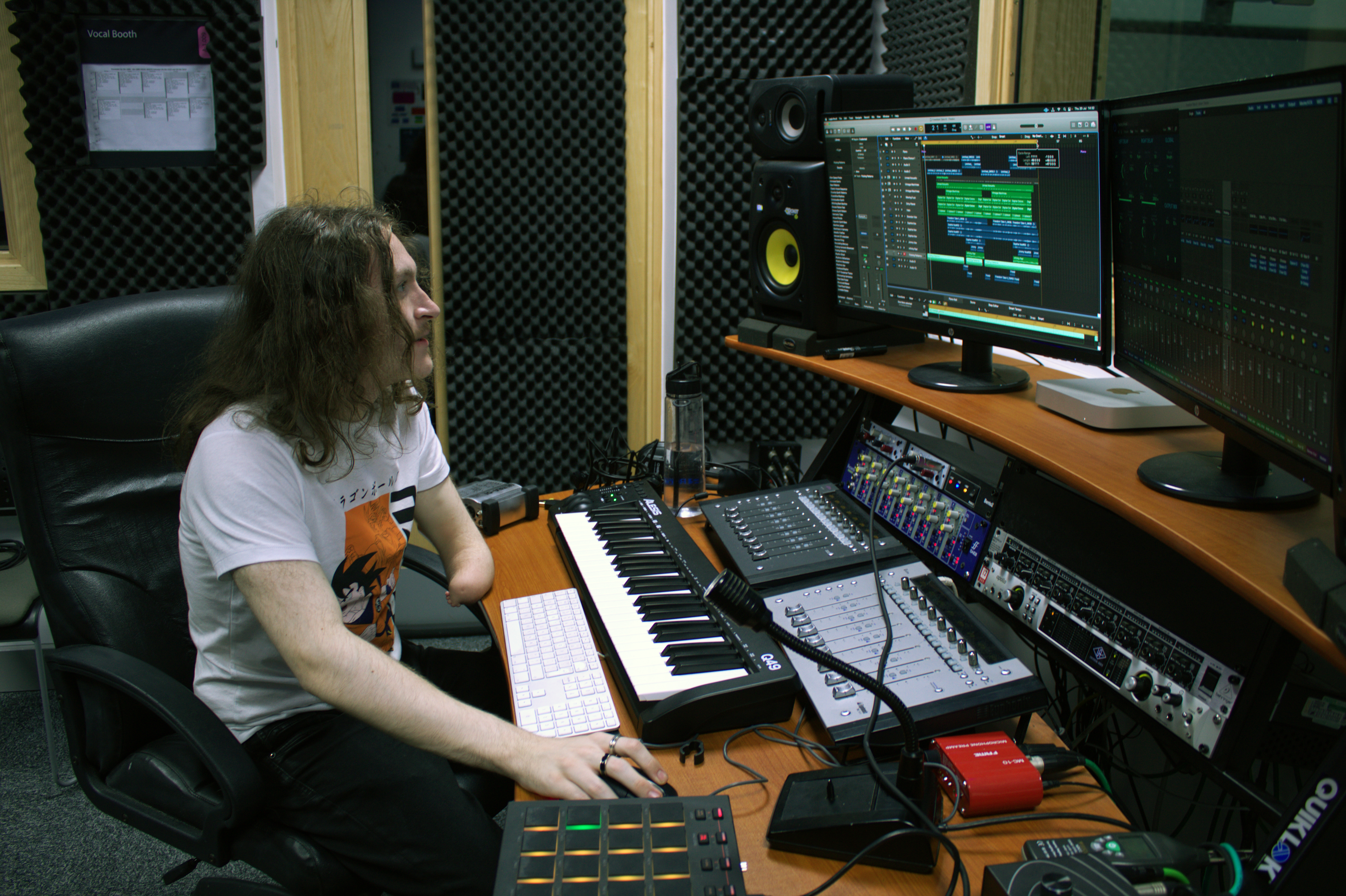 Young man producing music at Kirklees College