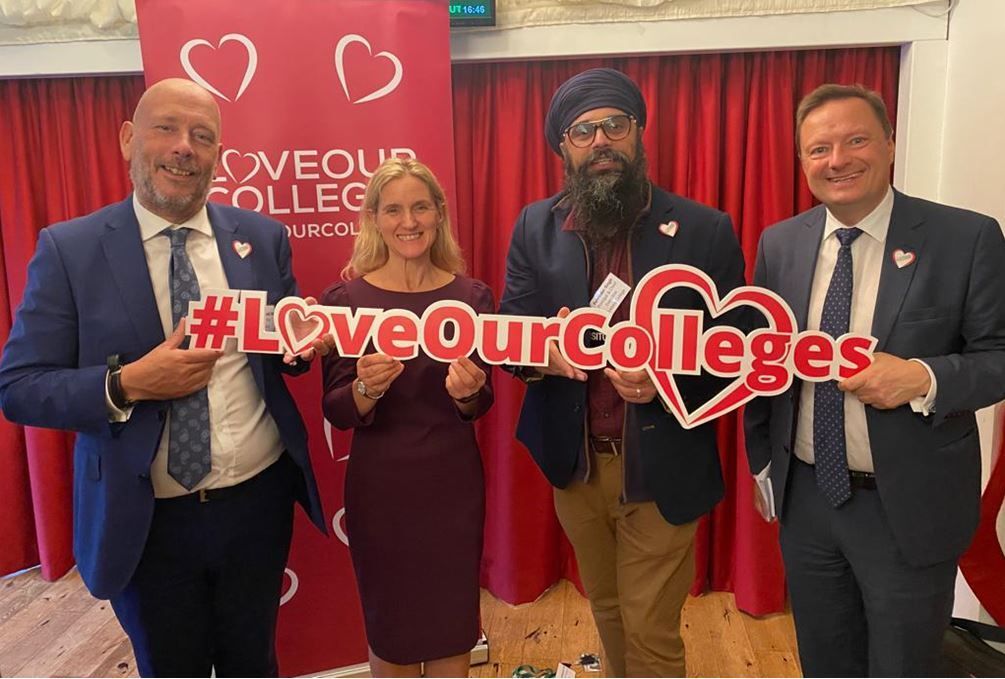 Mark Eastwood MP, Kim Leadbeater MP, Palvinder Singh Principal of Kirklees College, Jason McCartney MP stand in a row holding a sign that says #LoveOurColleges