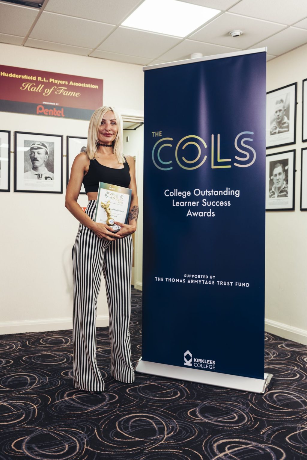 Student with award at COLS Awards 2025