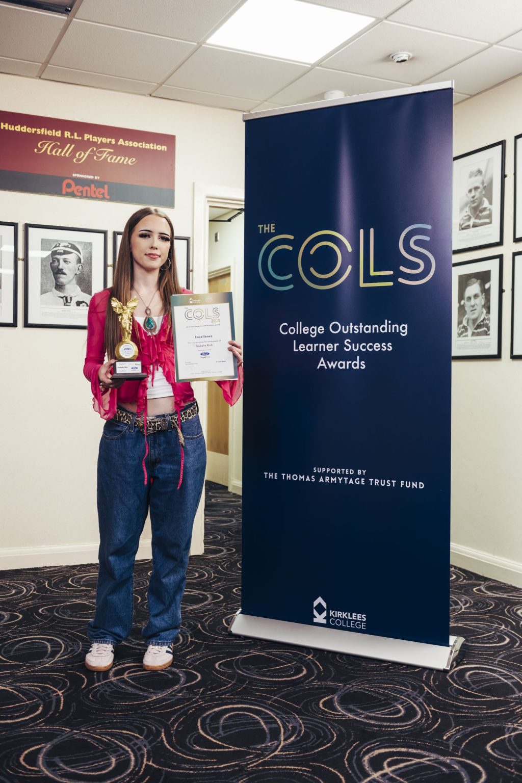 Student with award at COLS Awards 2025