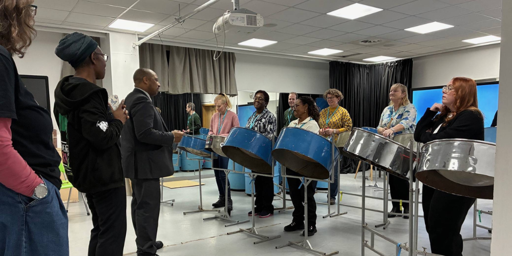 Steel Pan lesson with staff and students