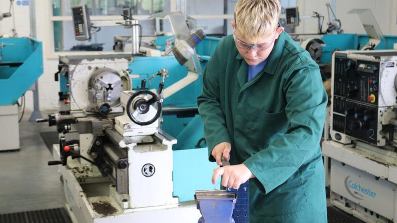 Women in Engineering - Female Engineering Student Working with Mechanical Engineering Equipment