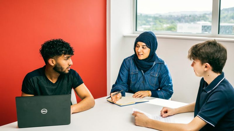 Business Students Having Board Room Meeting