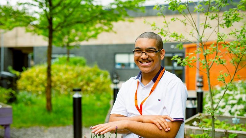 Foundation Learning Student Candid Smile in Sensory Garden