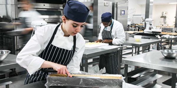 Catering student at Kirklees working in the kitchen